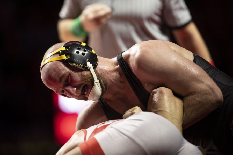 Iowa’s No. 5 165-pound Alex Marinelli wrestles Nebraska’s No. 30 Bubba Wilson during a wrestling dual between No. 2 Iowa and No. 10 Nebraska at the Bob Devany Center in Lincoln, NE on Sunday, Feb 20, 2022. Marinelli defeated Wilson 8-2. The Hawkeyes defeated the Cornhuskers 20-15 in their final regular season dual.