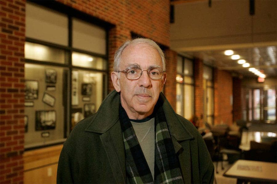 Iowa Nonfiction Writing Program founder Carl Klaus stands inside Adler Journalism Building Monday, March 27, 2006. 