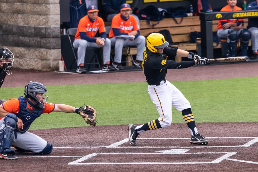 Iowa infielder Michael Seegers hits the ball during the Iowa Baseball game against Illinois on May 15, 2021 at Duane Banks Field. Illinois defeated Iowa 14-1. 
