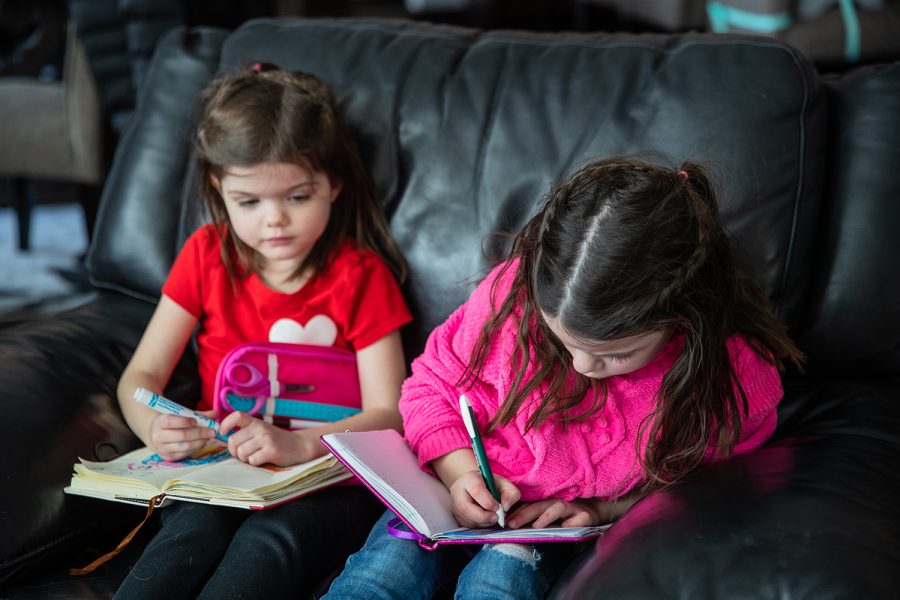 Lauryn and Landyn Mitchell draw pictures at their grandparents Dale and Juli Wirtjes' house in Cedar Rapids on Saturday, Feb. 12, 2022. Juli and Dale have been married for almost 40 years. 