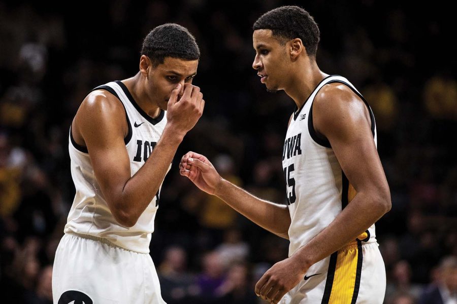 Iowa+forwards+Kris+and+Keegan+Murray+talk+during+a+break+in+the+play+at+a+men%E2%80%99s+basketball+game+between+Iowa+and+Indiana+at+Carver-Hawkeye+Arena+on+Thursday%2C+Jan.+13%2C+2022.+The+Hawkeyes+defeated+the+Hoosiers%2C+83-74.+