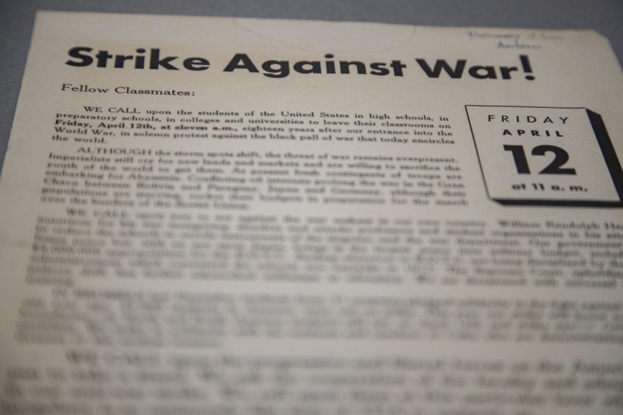 A Vietnam War era protest poster sits in the University of Iowa Libraries Special Collections on Friday, Oct. 29, 2021. The poster calls for fellow classmates to leave their classes in protest of the war. Several historical items were gathered for a display that celebrates the university’s 175th anniversary. 