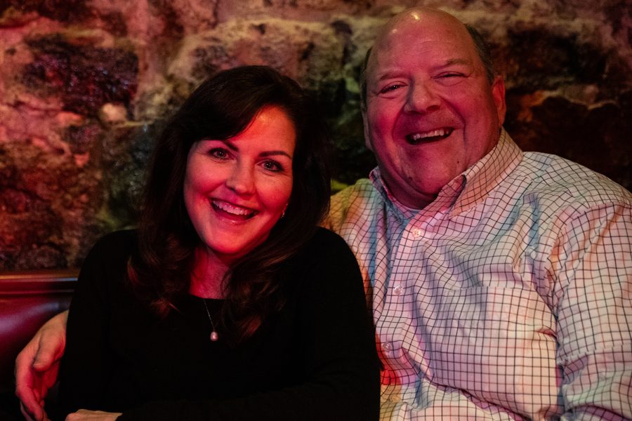 Juli and Dale Wirtjes pose for a portrait at St. Burch Tavern in Iowa City on Thursday, Feb. 3, 2022. The couple met at St. Burch Tavern while they were in college. 