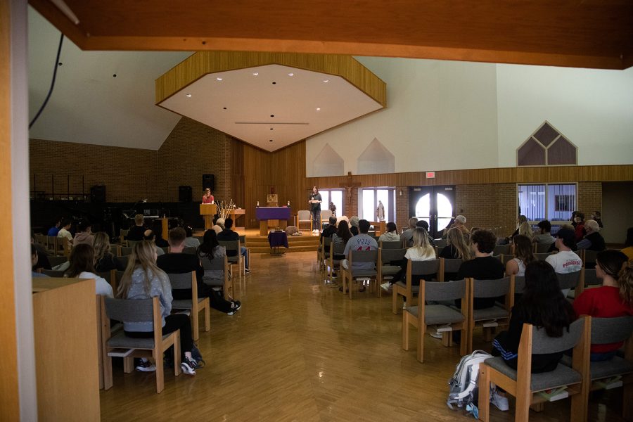 University of Iowa students and Iowa City residents attend a mass on Ash Wednesday at the Newman Center on March 2, 2022.