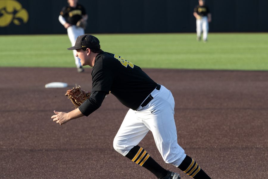 Iowa first baseman Peyton Williams  prepares to field a roundball during a baseball game at Duane Banks Field on March 2, 2022.The Hawkeyes defeated the Rams, 8-0. Williams scored two runs in the game.