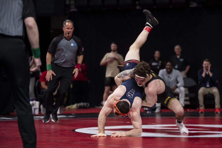 Live results | Iowa men's wrestling team competes in Session I of Big ...