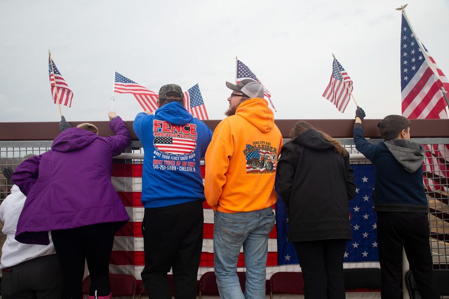 Lines of supporters show up on the Dodge Street pedestrian bridge for the Midwest Freedom Convoy on Saturday, March 5, 2022. The Midwest Convoy came through I-80 to protest Covid-19 mandates.