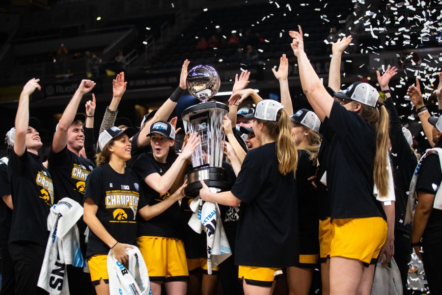 Iowa players celebrate after a basketball game between No. 2 Iowa and No. 5 Indiana during the Big Ten Womens Basketball Tournament Championship Game at Gainbridge Fieldhouse in Indianapolis on Sunday, March 6, 2022. The Hawkeyes beat the Hoosiers, 74-67.