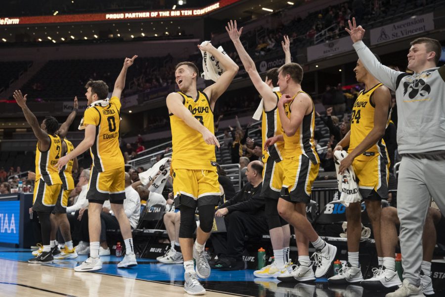 Iowa%E2%80%99s+bench+celebrates+a+3-pointer+during+a+men%E2%80%99s+basketball+game+between+No.+5+Iowa+and+No.+12+Northwestern+in+the+Big+Ten+Basketball+Tournament+at+Gainbridge+Fieldhouse+in+Indianapolis+on+Thursday%2C+March+10%2C+2022.+The+Hawkeyes+defeated+the+Wildcats%2C+112-76.+Iowa+set+a+Big+Ten+tournament+record+with+19+made+3-pointers.+%28Dimia+Burrell%2FThe+Daily+Iowan%29