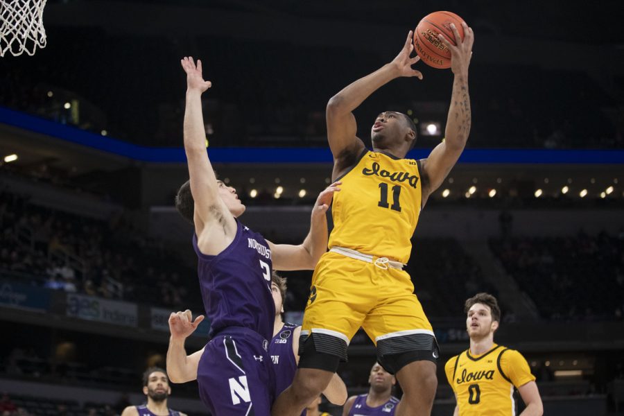 Iowa guard Tony Perkins shoots a layup during a men’s basketball game between No. 5 Iowa and No. 12 Northwestern in the Big Ten Basketball Tournament at Gainbridge Fieldhouse in Indianapolis on Thursday, March 10, 2022. The Hawkeyes defeated the Wildcats, 112-76.