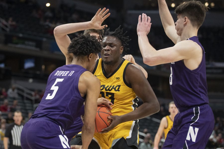 Iowa forward Josh Ogundele looks to shoot a layup during a men’s basketball game between No. 5 Iowa and No. 12 Northwestern in the Big Ten Basketball Tournament at Gainbridge Fieldhouse in Indianapolis on Thursday, March 10, 2022. The Hawkeyes defeated the Wildcats, 112-76. Ogundele scored 4 points.