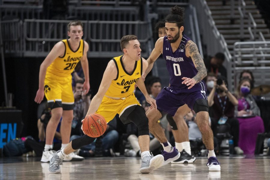 Iowa mens basketball guard Jordan Bohannon dribbles the ball during a 112-76 win over Northwestern in the second round of the Big Ten Mens Basketball Tournament in Indianapolis at the Gainbridge Fieldhouse on Thursday, March 10.