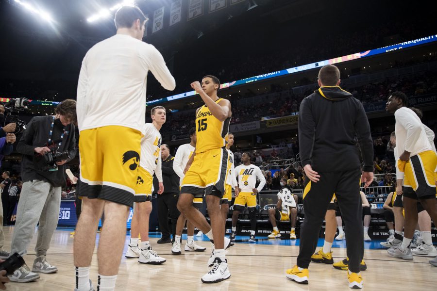 Iowa forward Keegan Murray is introduced in the starting lineup during a men’s basketball game between No. 5 Iowa and No. 4 Rutgers in the Big Ten Basketball Tournament quarterfinals at Gainbridge Fieldhouse in Indianapolis on Friday, March 11, 2022. The Hawkeyes defeated the Scarlet Knights, 84-74. Murrays 26 points pushed him to 750 total points on the season, breaking Luka Garzas previous single-season scoring record of 747 points.