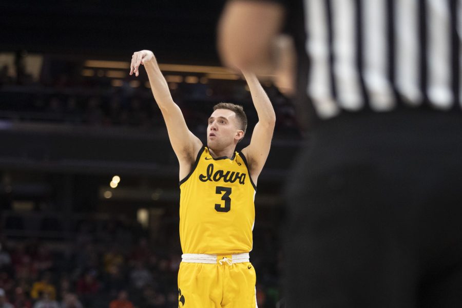 Iowa+guard+Jordan+Bohannon+shoots+a+3-pointer+during+a+men%E2%80%99s+basketball+game+between+No.+5+Iowa+and+No.+4+Rutgers+in+the+Big+Ten+Basketball+Tournament+quarterfinals+at+Gainbridge+Fieldhouse+in+Indianapolis+on+Friday%2C+March+11%2C+2022.+The+Hawkeyes+defeated+the+Scarlet+Knights%2C+84-74.+Bohannon+scored+16+points%2C+reaching+his+2000+career+point+milestone.+
