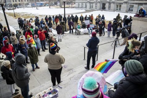 V Fixmer-Oraiz, a transgender citizen and Johnson County Supervisor, speaks during a transgender rights protest at the Pentacrest on March 11. Simon Reichel attended the protest. 