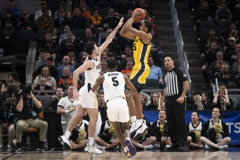 Iowa forward Keegan Murray shoots a ball during a men’s basketball game between No. 5 Iowa and No. 3 Purdue in the Big Ten Basketball Tournament Championship at Gainbridge Fieldhouse in Indianapolis on Sunday, March 13, 2022. (Dimia Burrell/The Daily Iowan)