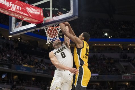 Iowa forward Keegan Murray dunks a ball during the 2022 Big Ten Men’s Basketball Championship between No. 5 Iowa and No. 3 Purdue at Gainbridge Fieldhouse in Indianapolis on Sunday, March 13, 2022. Murray led the team in scoring with 19 points, getting awarded the Big Ten Tournament Most Valuable Player. The Hawkeyes defeated the Boilermakers, 75-66.