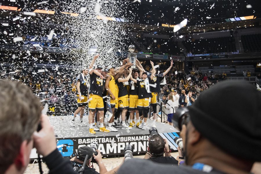 Iowa celebrates a win during a men’s basketball game between No. 5 Iowa and No. 3 Purdue in the Big Ten Basketball Tournament Championship at Gainbridge Fieldhouse in Indianapolis on Sunday, March 13, 2022. The Hawkeyes defeated the Boilermakers, 00-00. (Dimia Burrell/The Daily Iowan)