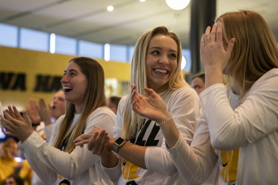 Iowa guard Kylie Feuerbach celebrates after learning Iowa was selected as a No. 2 seed during a NCAA Tournament Selection Sunday watch party at Carver-Hawkeye Arena in Iowa City on Sunday, March 13, 2022. Iowa will matchup with Illinois State at Carver-Hawkeye Arena on Friday.