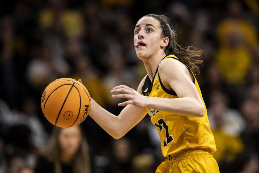 Iowa guard Caitlin Clark dribbles toward the hoop during a First Round NCAA women’s basketball tournament game against No. 2 Iowa and No. 15 Illinois State in sold-out Carver-Hawkeye Arena on Friday, March 18, 2022. Clark scored 27 points and was 9-of-15 in the field. The Hawkeyes defeated the Redbirds, 98-58, advancing themselves to the second round of the tournament.