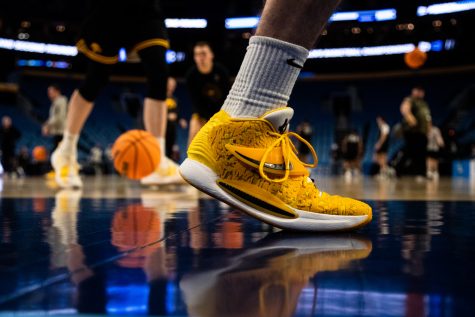 An Iowa player walks during a practice at KeyBank Center in Buffalo, N.Y., on Wednesday, March 16, 2022. The Iowa Hawkeyes face the Richmond Spiders at the first round of the NCAA Mens Basketball Championship Tournament on Thursday, March 17, 2022.