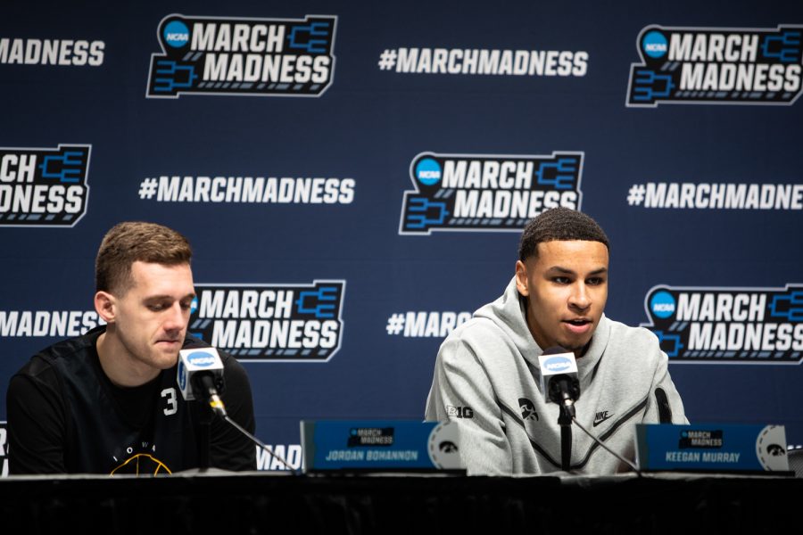 Iowa guard Jordan Bohannon listens as forward Keegan Murray responds to a journalists question during a press conference at KeyBank Center in Buffalo, N.Y., on Wednesday, March 16, 2022. We have an inexperienced team... going into this season, Murray said. So I just think he [Jordan Bohannon] has really brought us all together. The Iowa Hawkeyes face the Richmond Spiders at the first round of the NCAA Mens Basketball Championship Tournament on Thursday, March 17, 2022.
