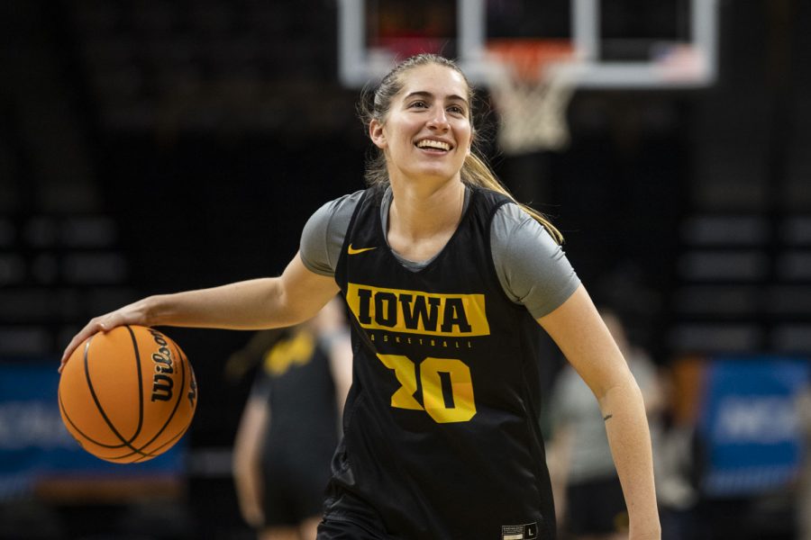 Iowa guard Kate Martin dribbles the ball during the 2022 NCAA First Round women’s basketball pregame open practices at Carver-Hawkeye Arena on Thursday, March 17, 2022. During a press conference before the practice, Iowa head coach Lisa Bluder spoke about Martin’s game and personality. “She is the epitome of a teammate as far as she’s going to look out for everybody else,” Bluder said. “She puts everybody else ahead of herself.”