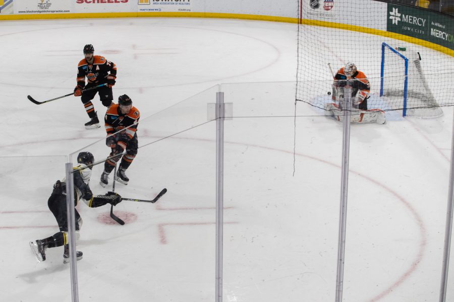 Fort Wayne goalie Samuel Harvey blocks a goal attempt during a game between the Fort Wayne Komets and Iowa Heartlanders at XTream Arena on Wednesday, March 9, 2022. The Komets end the Heartlanders’ seven-game win streak with a 6-0 victory.