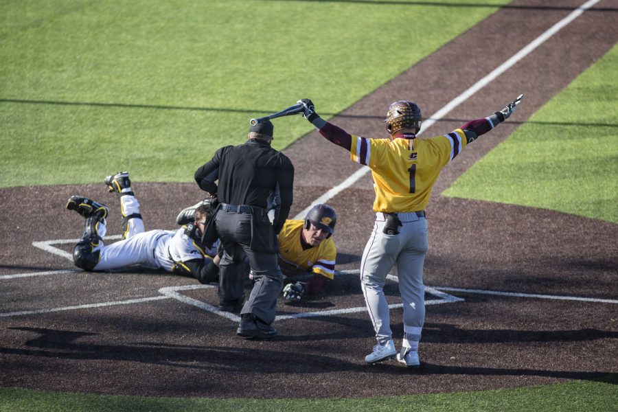 Central Michigan catcher Adam Proctor slides into home plate during a baseball game between Iowa and Central Michigan at Duane Banks Field in Iowa City on Saturday, March 26, 2022. Proctor went to bat four times and scored two runs. The Chippewas defeated the Hawkeyes, 10-1, making the three game series tied at 1-1.