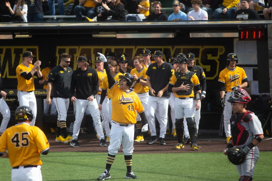 The Iowa baseball team celebrates during a baseball game between Iowa and Texas Tech at Duane Banks Field on Sunday, March 20, 2022. The Hawkeyes defeated the Red Raiders 6-3. 