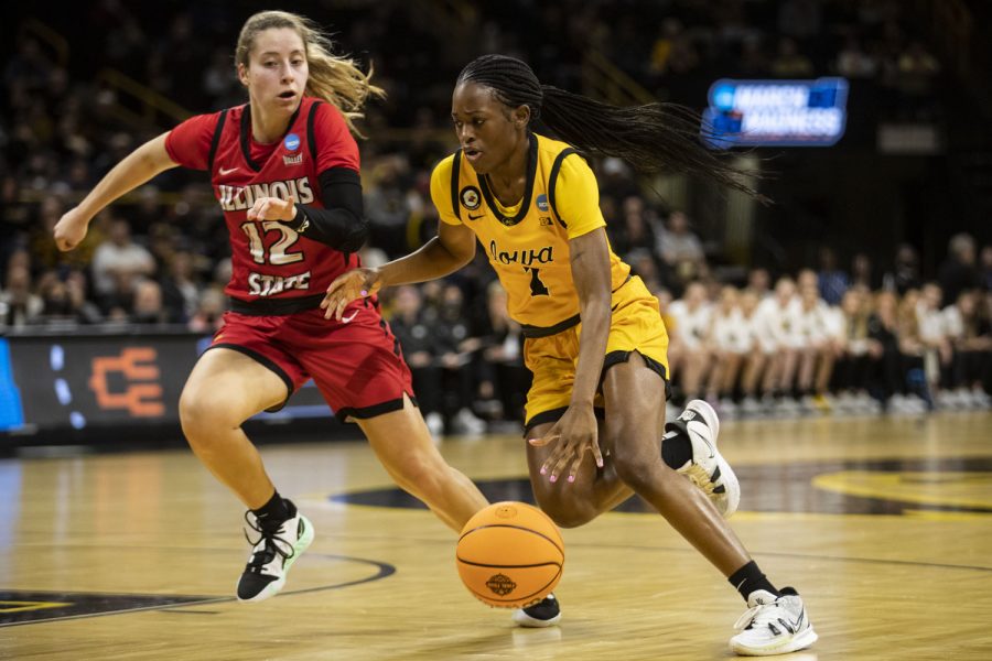 Iowa guard Tomi Taiwo dribbles to the hoop during a First Round NCAA women’s basketball tournament game against No. 2 Iowa and No. 15 Illinois State in sold-out Carver-Hawkeye Arena on Friday, March 18, 2022. Taiwo shot a total of 13 points. The Hawkeyes defeated the Redbirds, 98-58, advancing themselves to the second round of the tournament.