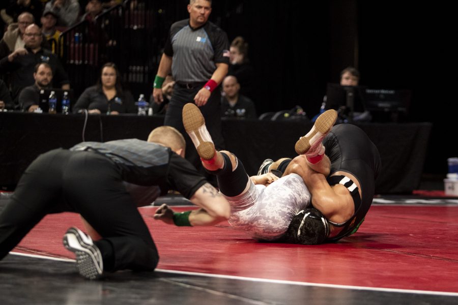 Iowa’s No. 4 Michael Kemerer pins Rutgers’ No. 13 Connor O’Neil during session one of the Big Ten Wrestling Championships at Pinnacle Bank Arena in Lincoln, Neb., on Saturday, March 5, 2022. Kemerer pinned O’Neil in two minutes and 31 seconds during a 174-pound match.