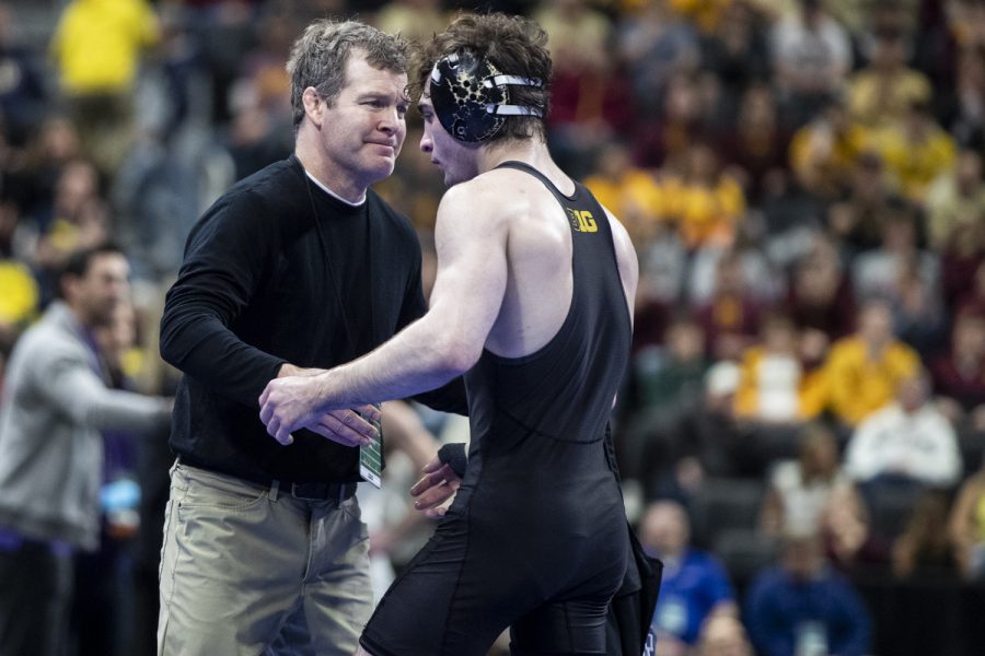 Iowa+head+coach+Tom+Brands+embraces+Iowas+No.+5+Austin+DeSanto+after+his+final+collegiate+match+against+Arizona+States+No.+3+Michael+McGee+in+session+five+at+the+NCAA+Wrestling+Championships+at+Little+Caesars+Arena+in+Detroit%2C+Mich.%2C+on+Saturday%2C+March+19%2C+2022.+DeSanto+defeated+McGee+in+a+133-pound+match%2C+7-4.+DeSanto+finished+his+collegiate+career+as+a+four-time+All-American.+DeSanto+is+Iowa%E2%80%99s+23rd+four-time+All-American.