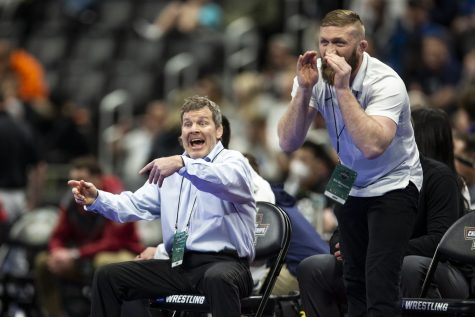 Iowa head coach Tom Brands reacts during Iowas No. 5 Austin DeSanto’s match session two at the NCAA Wrestling Championships at Little Caesars Arena in Detroit, Mich., on Thursday, March 17, 2022.