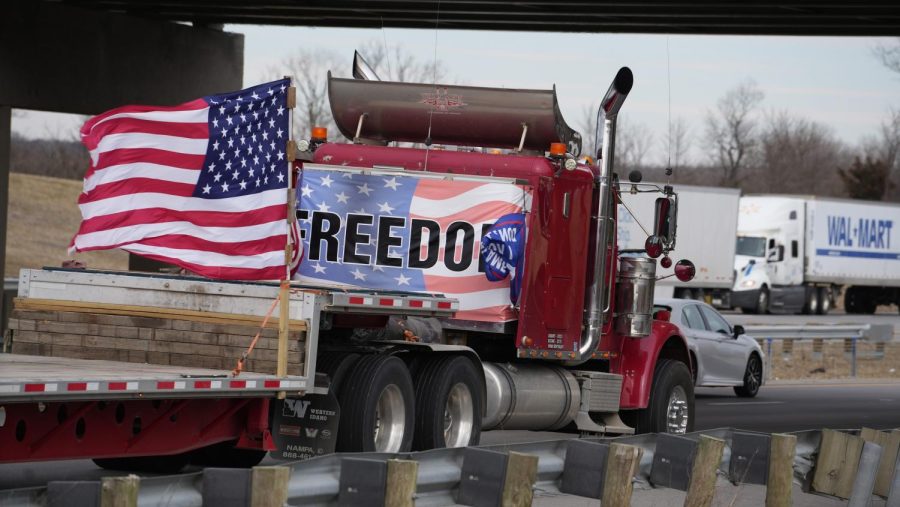A vehicle in the Peoples Convoy passes by on I-70 in West Jefferson, Ohio Thursday, March 3, 2022. (Syndication: The Columbus Dispatch)