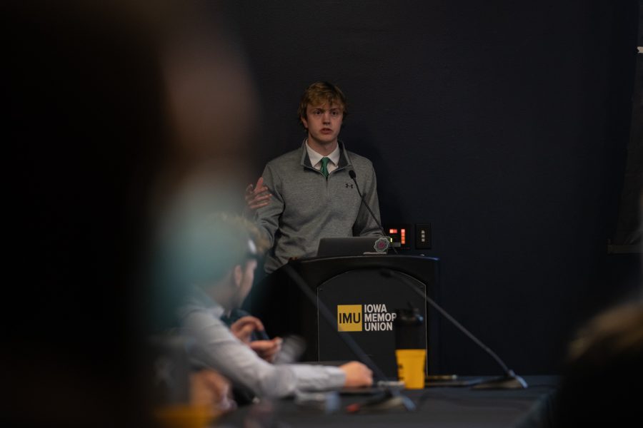 Robert Jepsen speaks about the implementation of a sustainability focused course requirement at the University of Iowa to senators during a University Student Government meeting on Tuesday, March 29, 2022.
