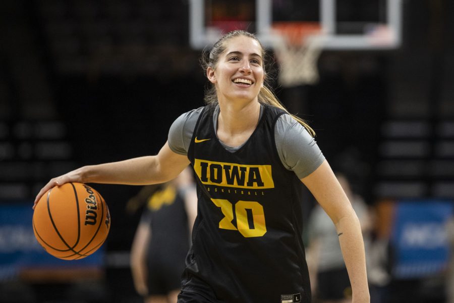 Iowa guard Kate Martin dribbles the ball during the 2022 NCAA First Round women’s basketball pre-game open practices at Carver-Hawkeye Arena on Thursday, March 17, 2022. 