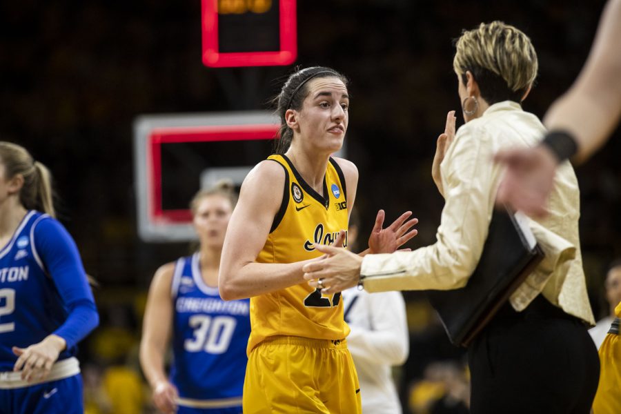 Iowa guard Caitlin Clark walks off the court at halftime during a 2022 NCAA Second Round women’s basketball game between No. 2 Iowa and No. 10 Creighton in sold-out Carver-Hawkeye Arena on Sunday, March 20, 2022.