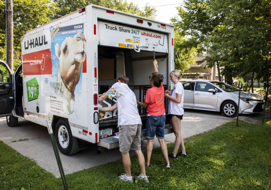Will Meyer, left, and Kacie Frederick check the load of the U-Haul on Monday, July 26, 2021. Frederick said she had to move out of her old apartment but cannot get into her new one for 3 days, so they have to leave her things in the U-Haul. 