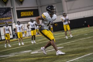 Iowa first-year and five-star recruit Xavier Nwankpa participates in a drill during an Iowa football open practice at the Hansen Football Performance Center in Iowa City on Tuesday, March 29, 2022.