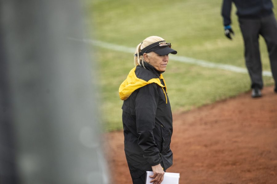 Iowa head coach Renee Gillispie observes action during a softball game between Iowa and Wisconsin at Bob Pearl Field in Iowa City on Friday, March 25, 2022. The Badgers defeated the Hawkeyes, 10-5.