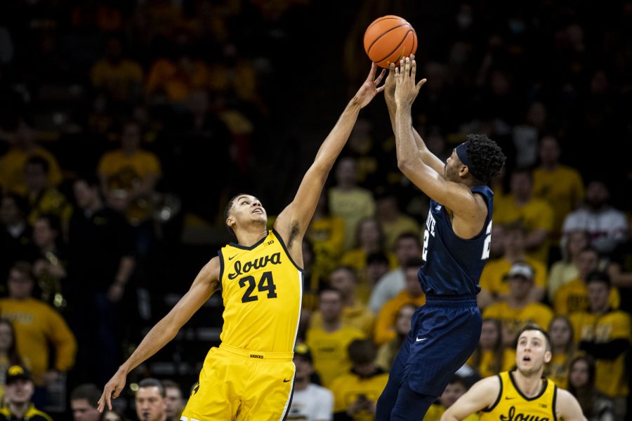 Iowa forward Kris Murray attempts to block a shot during a men’s basketball game between Iowa and Penn State at Carver-Hawkeye Arena on Saturday, Jan. 22, 2022. The Hawkeyes deflected five shots. The Hawkeyes defeated the Nittany Lions, 68-51.