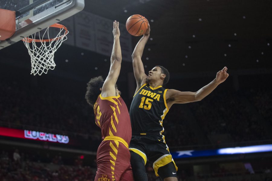 Iowa forward Keegan Murray attempts to dunk the basketball during a men’s basketball game between Iowa and No. 17 Iowa State at Hilton Coliseum in Ames on Thursday, Dec. 9, 2021. Murray came into the game as the nation’s leading scorer with 23.9 points per game but Iowa State held Murray to nine points.The Cyclones defeated the Hawkeyes, 73-53.