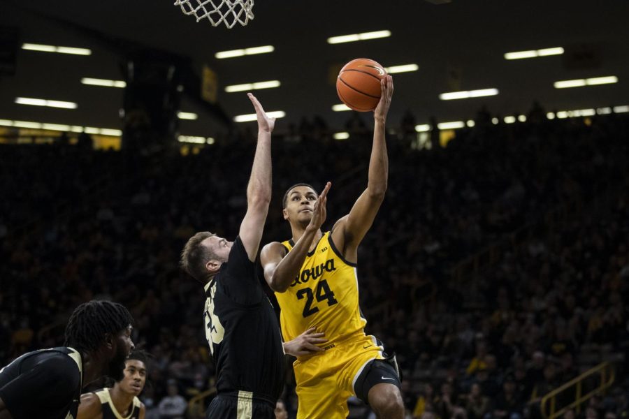 Iowa forward Kris Murray goes up for a shot in the paint during a basketball game between Iowa and No. 6 Purdue at Carver-Hawkeye Arena in Iowa City on Thursday, Jan. 27, 2022. The Boilermakers defeated the Hawkeyes, 83-73. Murray shot 6-15 in the paint.