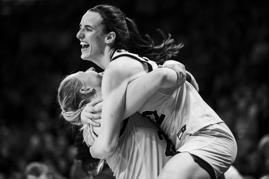 Iowa guard Caitlin Clark and center Monika Czinano hug during a women’s basketball game between No. 21 Iowa and No. 6 Michigan at Carver-Hawkeye Arena on Sunday, Feb. 27, 2022. Clark and Czinano had a combined 57 points. The Hawkeyes became regular season Big Ten co-Champions after defeating the Wolverines, 104-80.