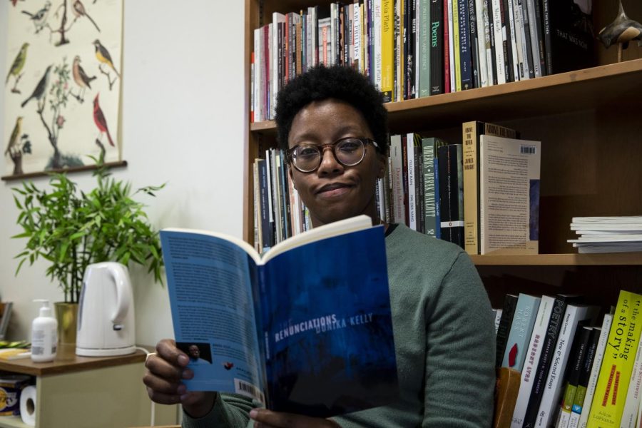 Author and Assistant Professor Donika Kelly poses for a portrait in the English Philosophy Building at the University of Iowa on Thursday, Jan. 27, 2022. 