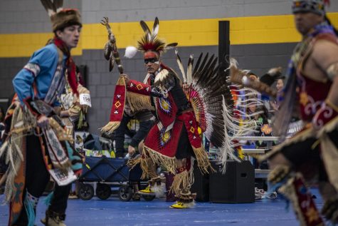 52-year-old attendee Tim Livingston, whose tribal affiliation is the Klamath Tribe from Oregon, performs during the 26th Annual University of Iowa Powwow at the Field House in Iowa City on Saturday, April 2, 2022. This is the second UI Powwow Livingston has attended.
