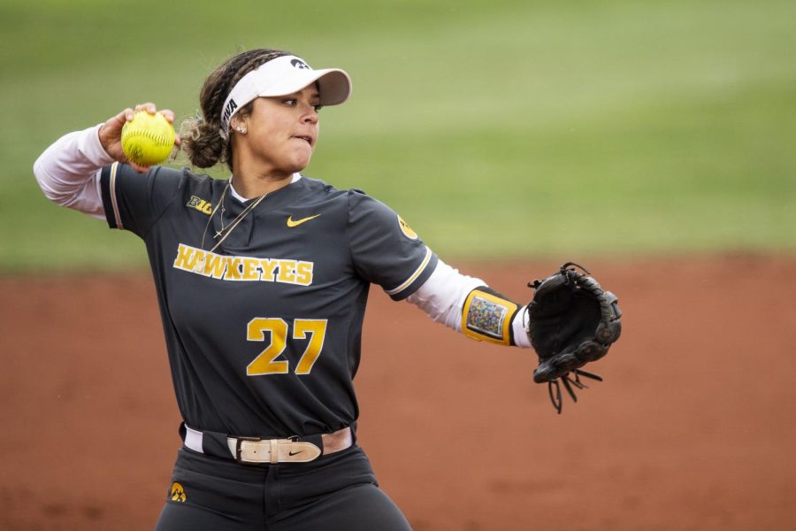 Iowa third baseman Amber Desana passes to first base during a softball game between Iowa and Drake at Pearl Field in Iowa City, Iowa, on Wednesday, April 6, 2022. Desana had six assists. The Hawkeyes defeated the Bulldogs, 3-2.
