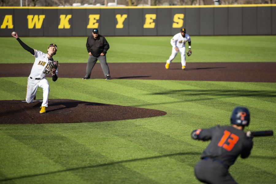 Iowa pitcher Adam Mazur throws a pitch during the second baseball game of a doubleheader between Iowa and Illinois at Duane Banks Field in Iowa City on Saturday, April 9, 2022. Mazur threw nine strikeouts in six innings. The Fighting Illini defeated the Hawkeyes in 13 innings, 7-5.