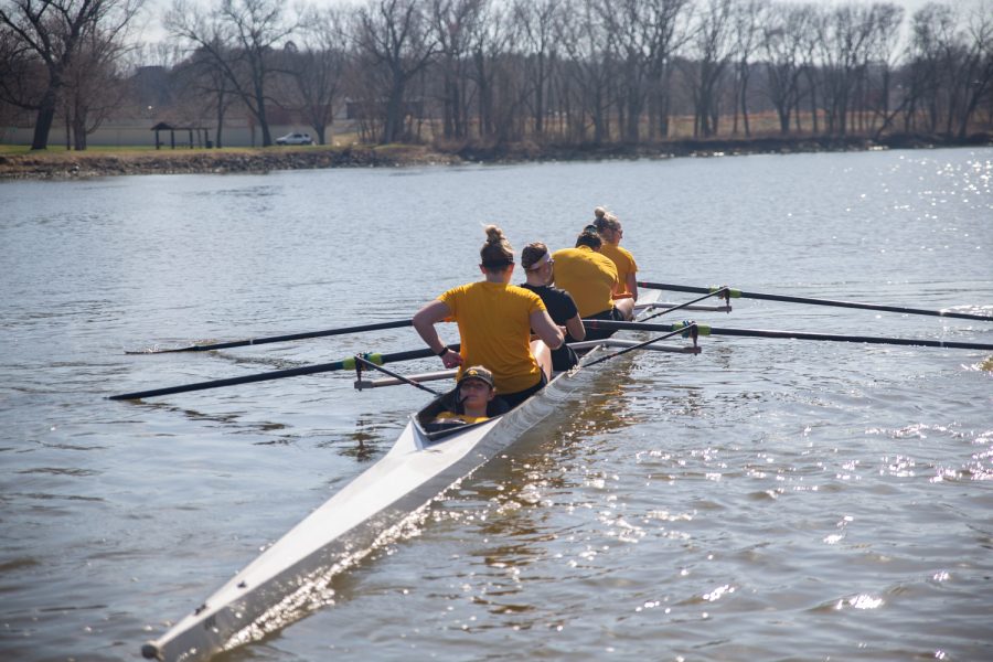 A 4-woman row squad departs from the dock during an Iowa rowing practice on Monday, April 11, 2022. The rowing team competes in the Big Ten Invitational in Sarasota, Florida, on Friday and Saturday.